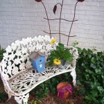 Vintage bench adds color and interest in a drab spot