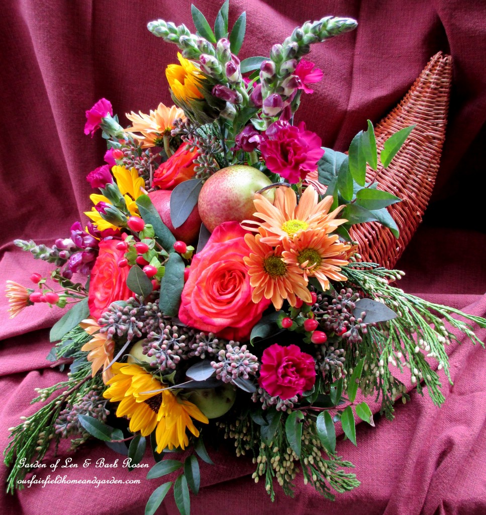 cornucopia https://ourfairfieldhomeandgarden.com/happy-thanksgiving-make-a-cornucopia-of-fresh-fruit-flowers-for-a-centerpiece/