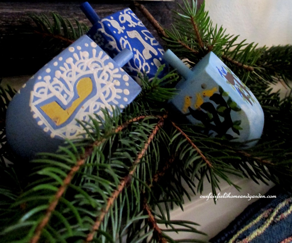 hand painted dreidels https://ourfairfieldhomeandgarden.com/its-beginning-to-look-a-lot-like-chanukah/