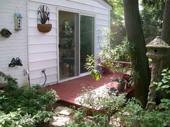 New sliders and deck before the potting sink https://ourfairfieldhomeandgarden.com/my-winter-sanctuary-scenes-from-a-garden-room/