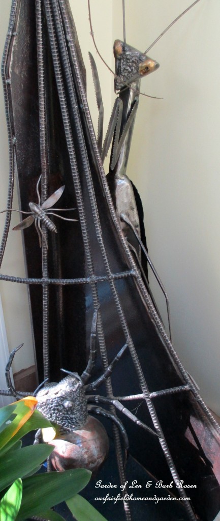 insect sculpture & clivias https://ourfairfieldhomeandgarden.com/my-winter-sanctuary-scenes-from-a-garden-room/