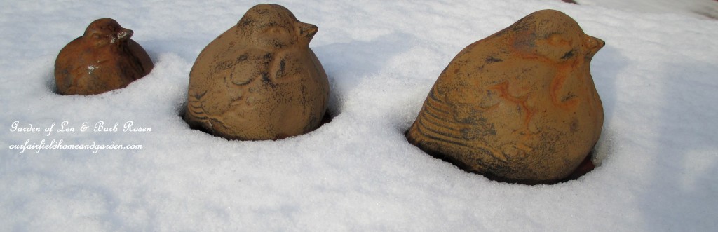 cast iron birds in the snow https://ourfairfieldhomeandgarden.com/january-winter-garden/
