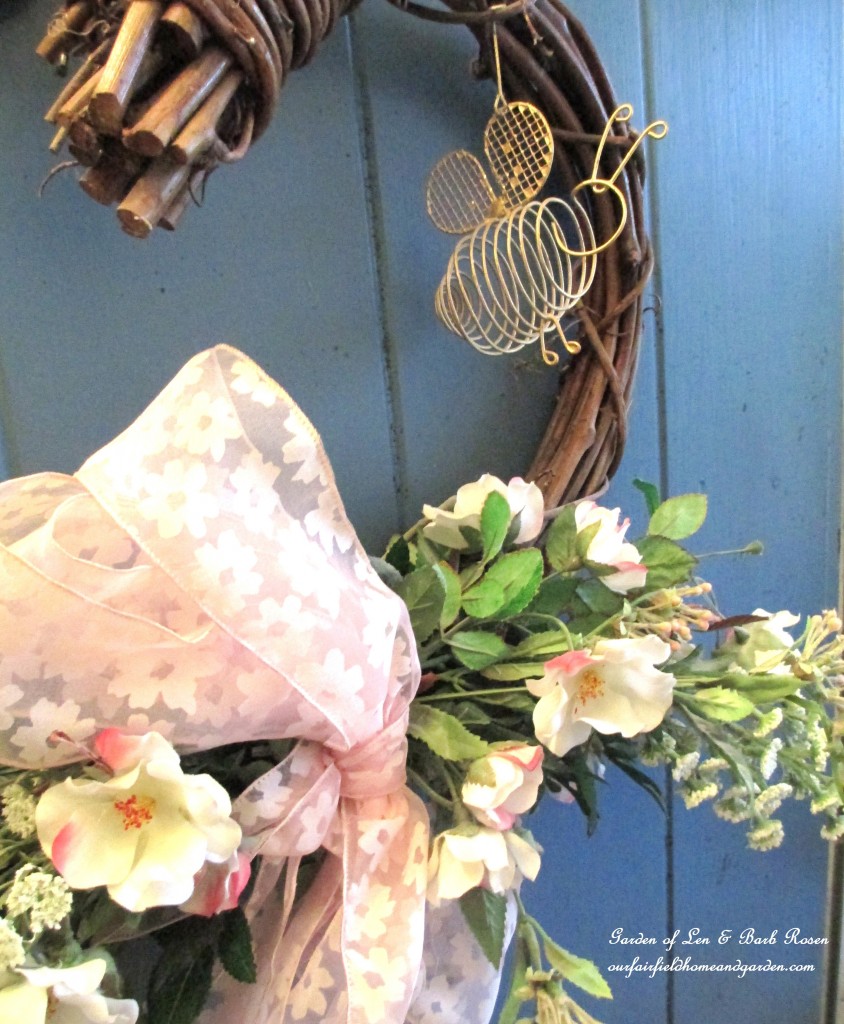 Close-up of the front door wreath https://ourfairfieldhomeandgarden.com/heart-home-valentines-day-is-coming/