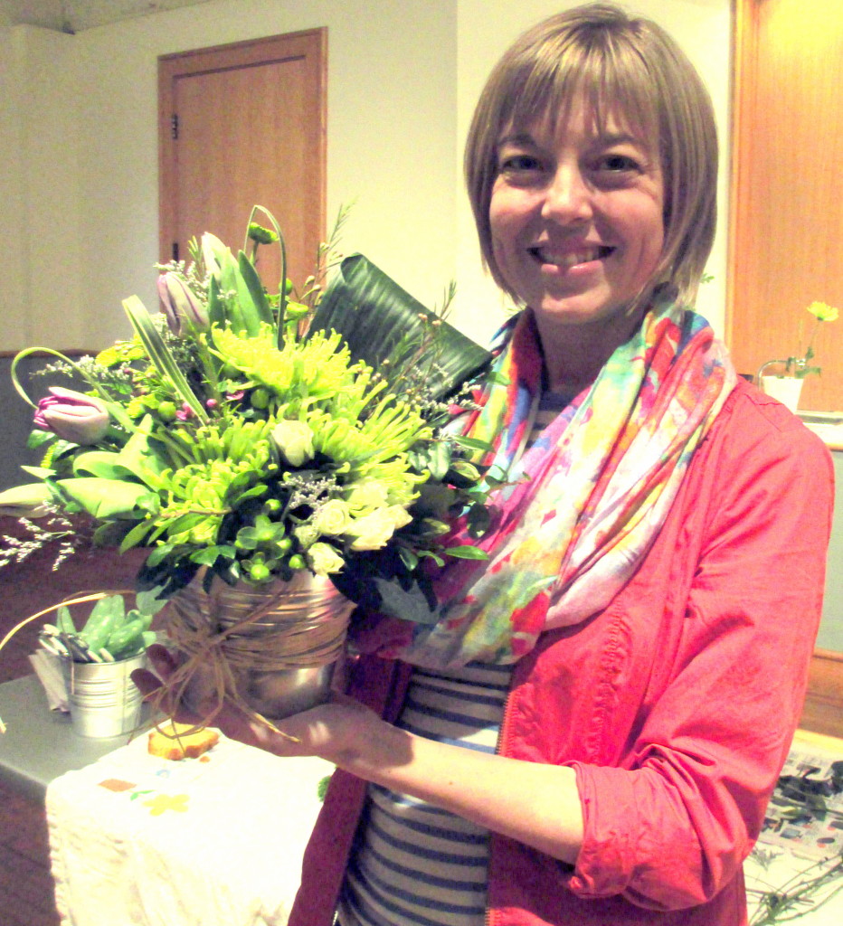 Emily Smith with her "Easy to be Green" floral arrangement.