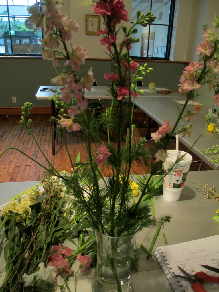 Start with the tallest flowers and layer by height.