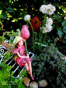 Tulip Fairy in her birdbath garden https://ourfairfieldhomeandgarden.com/diy-project-mothers-day-fairy-garden/