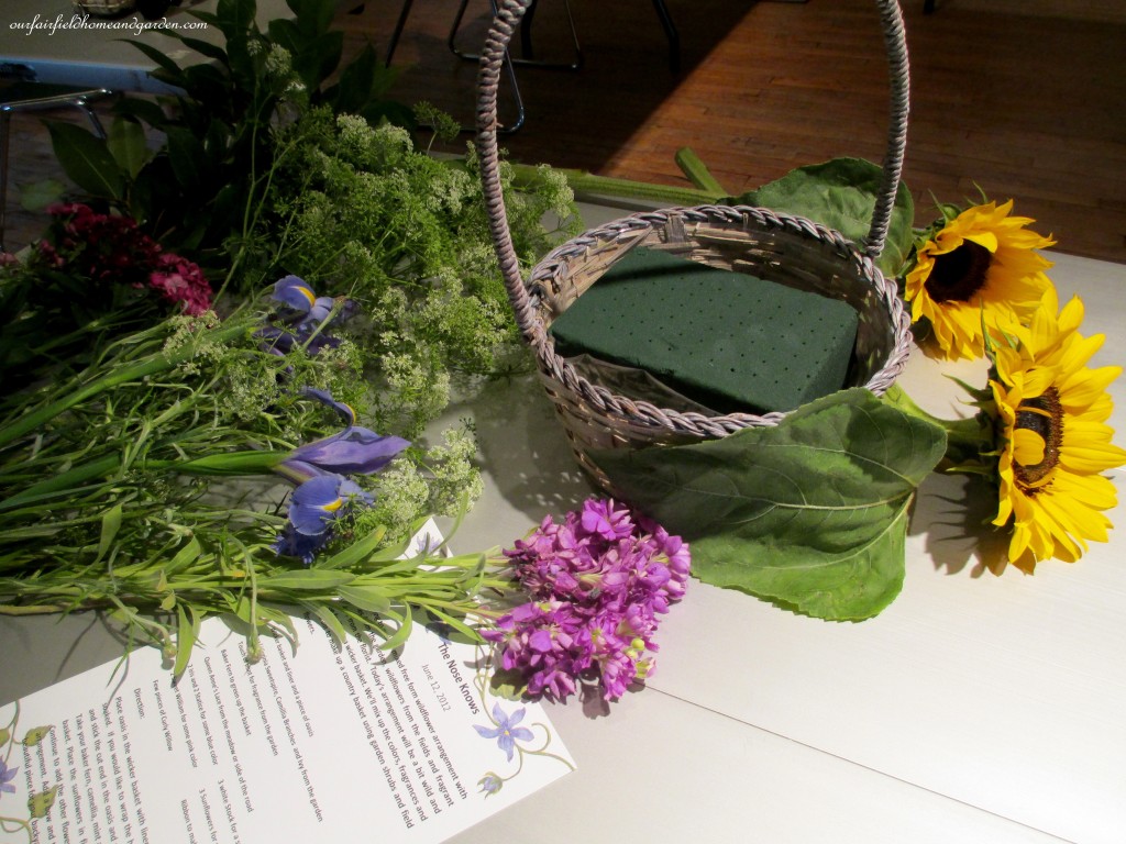 gathered materials ready to arrange https://ourfairfieldhomeandgarden.com/diy-project-country-flower-basket/