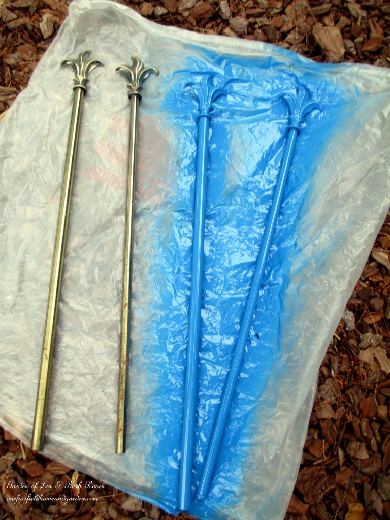 Paint the curtain rods the color desired https://ourfairfieldhomeandgarden.com/diy-project-hose-guides-from-curtain-rods/
