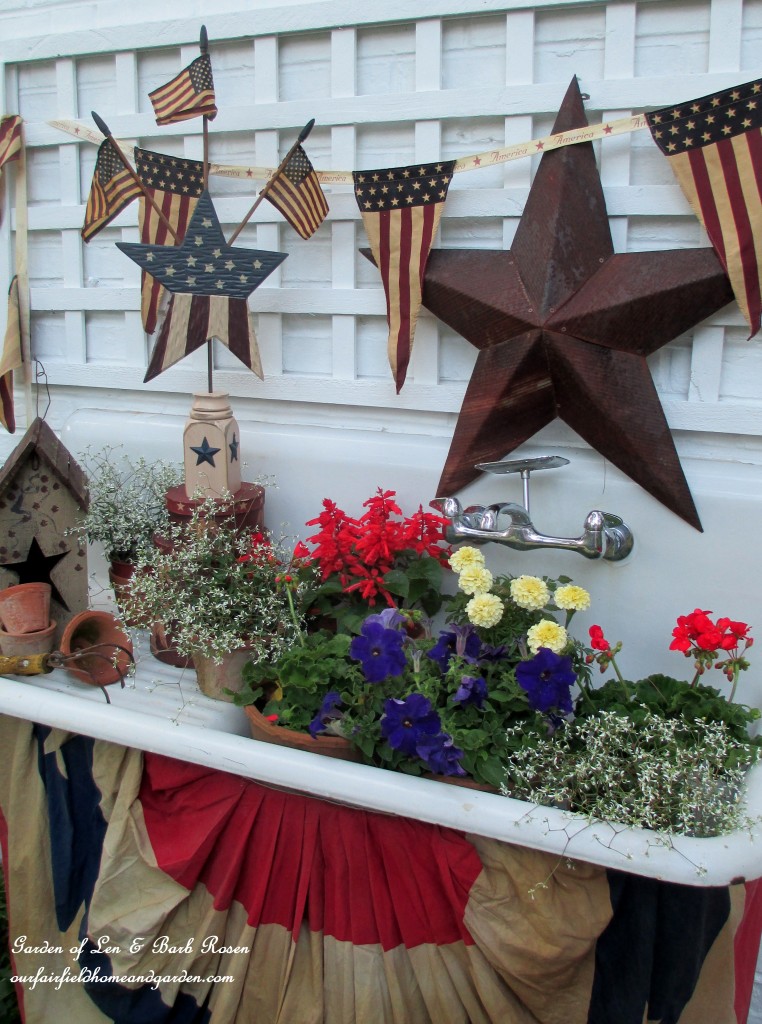 Red, white and blue flowers in the potting sink! https://ourfairfieldhomeandgarden.com/happy-4th-of-july-patriotic-potting-sink/