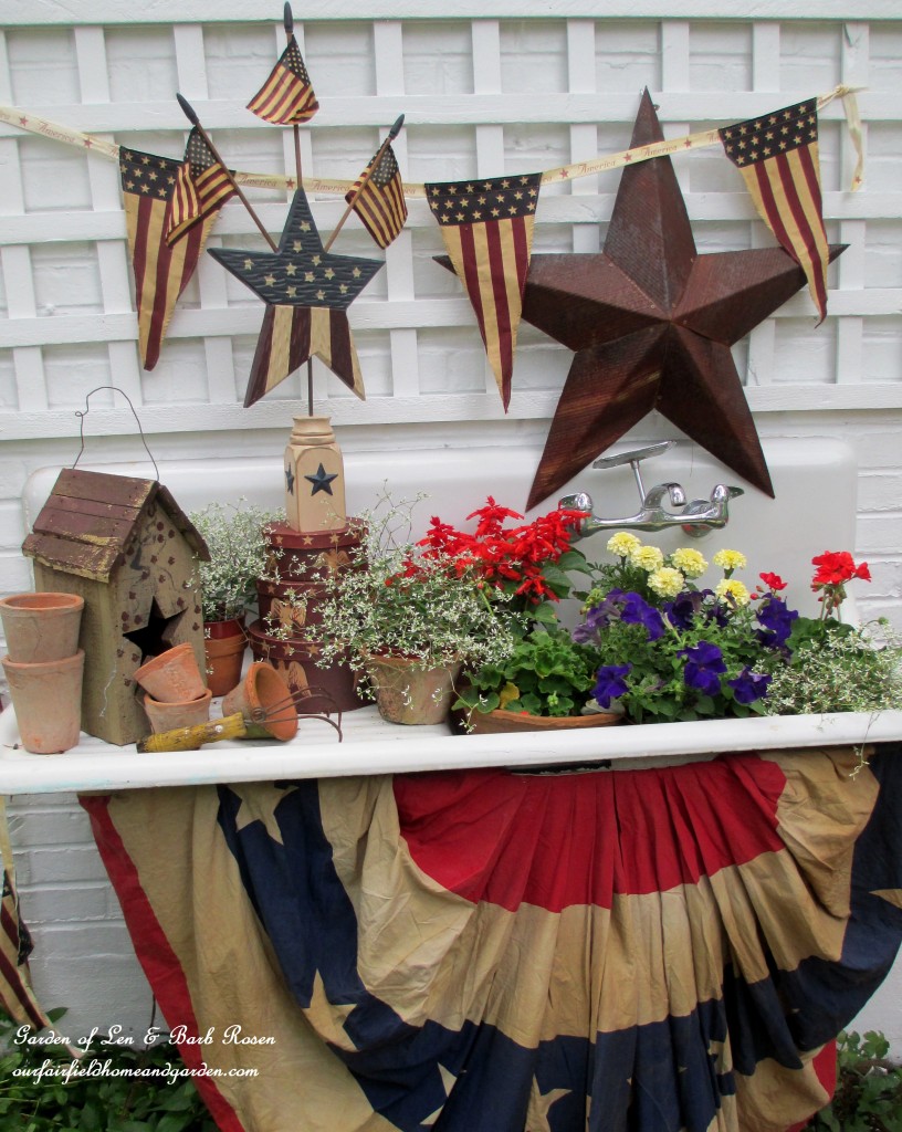The Potting Sink decorated for the 4th of July! https://ourfairfieldhomeandgarden.com/happy-4th-of-july-patriotic-potting-sink/
