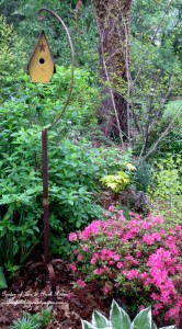 Birdcage Stand Birdhouse https://ourfairfieldhomeandgarden.com/its-all-about-the-birds-birdfeeders-birdbaths-and-birdhouses-in-our-garden/
