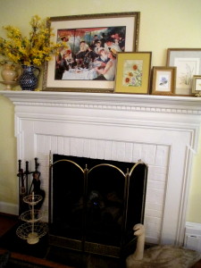 artwork placed on the mantel https://ourfairfieldhomeandgarden.com/livingroom-makeover-grandma-to-grandeur/