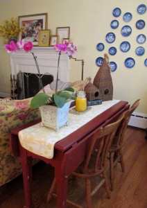 table becomes extra party seating https://ourfairfieldhomeandgarden.com/livingroom-makeover-grandma-to-grandeur/