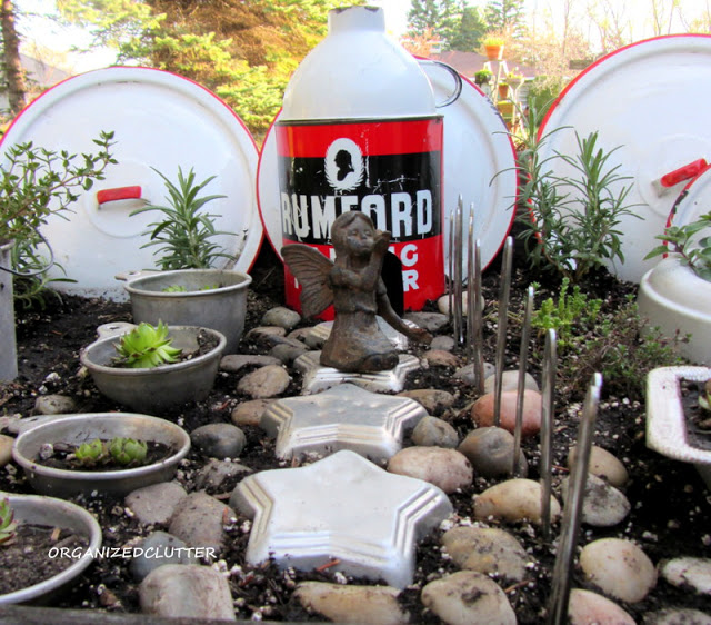Here's an imaginative kitchen themed fairy garden from Carlene at Organized Clutter! Click through for all the details!