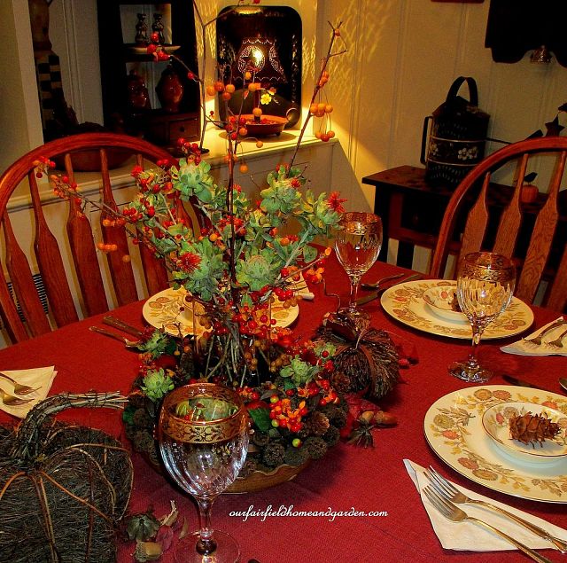 Thanksgiving Table decorated with Fall seed pods and bittersweet https://ourfairfieldhomeandgarden.com/autumn-garden-accents-inside-and-out/