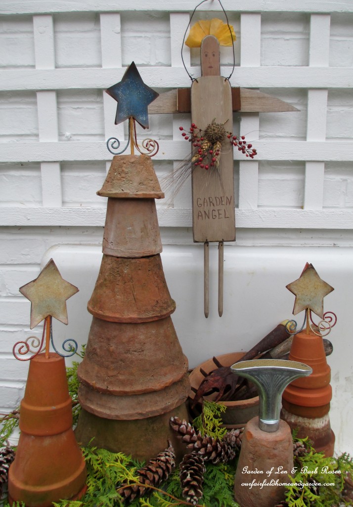 Flower Pot Trees https://ourfairfieldhomeandgarden.com/winter-decorating-at-our-fairfield-home-garden/