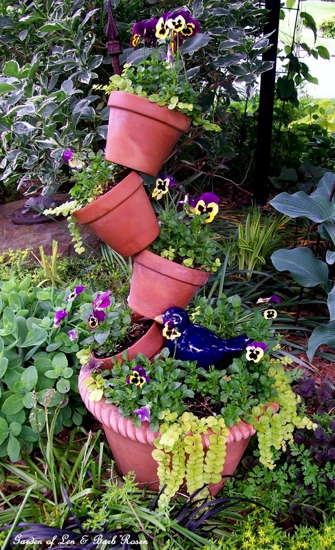Tipsy Planter Pots Tipsy Planter Pots https://ourfairfieldhomeandgarden.com/spring-fever/