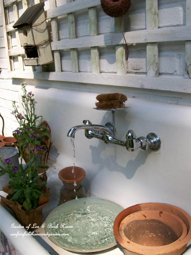 Kitchen Sink Fountain and Potting Bench https://ourfairfieldhomeandgarden.com/everything-including-the-kitchen-sink/