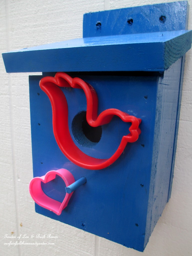 Cookie Cutter Birdhouse https://ourfairfieldhomeandgarden.com/kitschy-kitchen-garden-accents/
