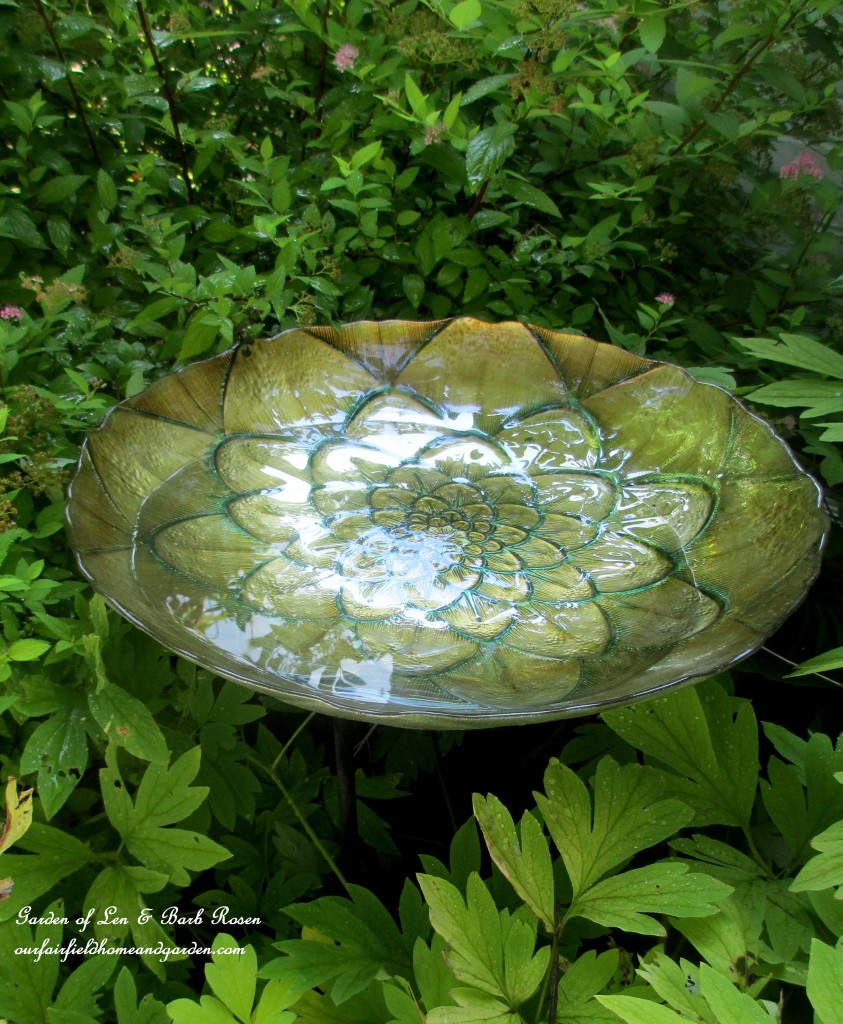 Decorative Dish Birdbath https://ourfairfieldhomeandgarden.com/diy-bird-baths-bring-birds-to-your-garden/