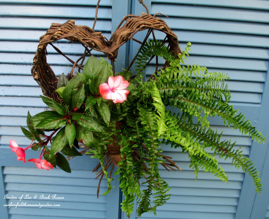 Planted Heart Basket https://ourfairfieldhomeandgarden.com/salvaged-the-32-shutter-challenge-repurposing-shutters-in-the-garden/