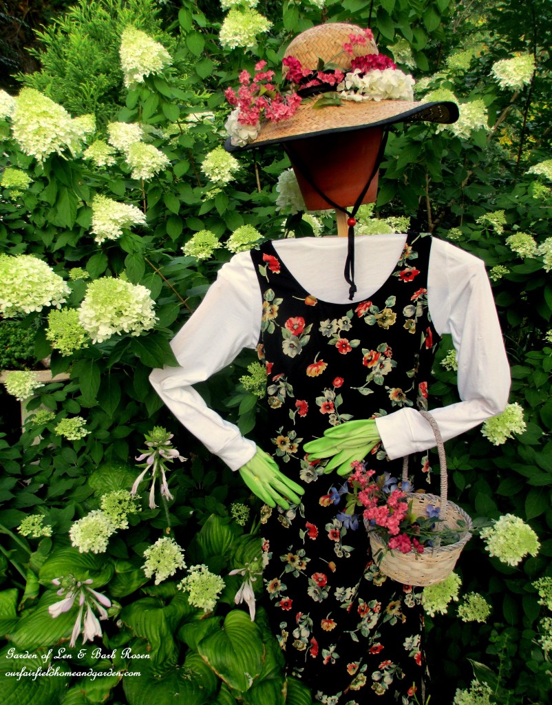 pretty scarecrow https://ourfairfieldhomeandgarden.com/diy-project-wood-scrap-scarecrow-my-garden-maiden/