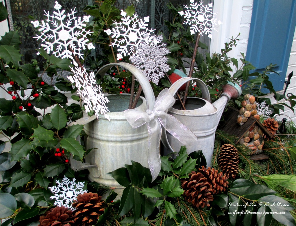 Rustic Winter Windowbox https://ourfairfieldhomeandgarden.com/rustic-watering-cans-windowboxes-more/