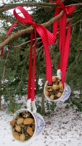Teacup Birdfeeders https://ourfairfieldhomeandgarden.com/birdfeeders-use-what-you-have/