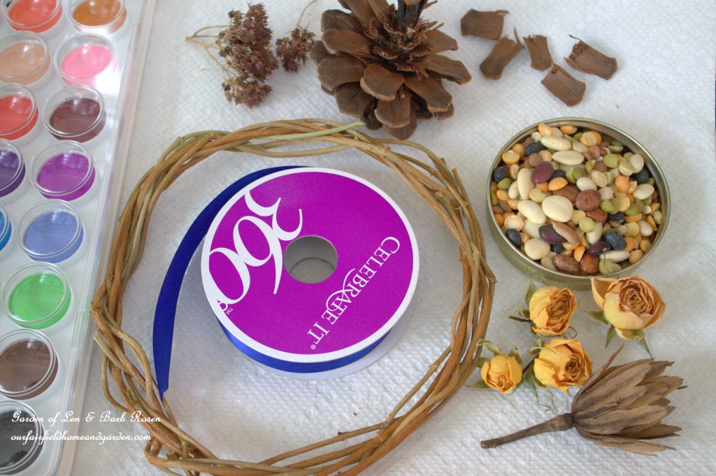 Dried flowers, pinecones, bean soup mix, hot glue, a wreath and ribbon are all you need. Watercolor paints can also be used o add color.https://ourfairfieldhomeandgarden.com/diy-spring-wreaths/