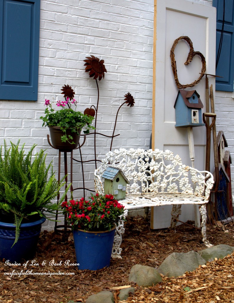 When you can't plant, make a vignette! https://ourfairfieldhomeandgarden.com/curb-appeal-hiding-an-eyesore-in-the-garden/