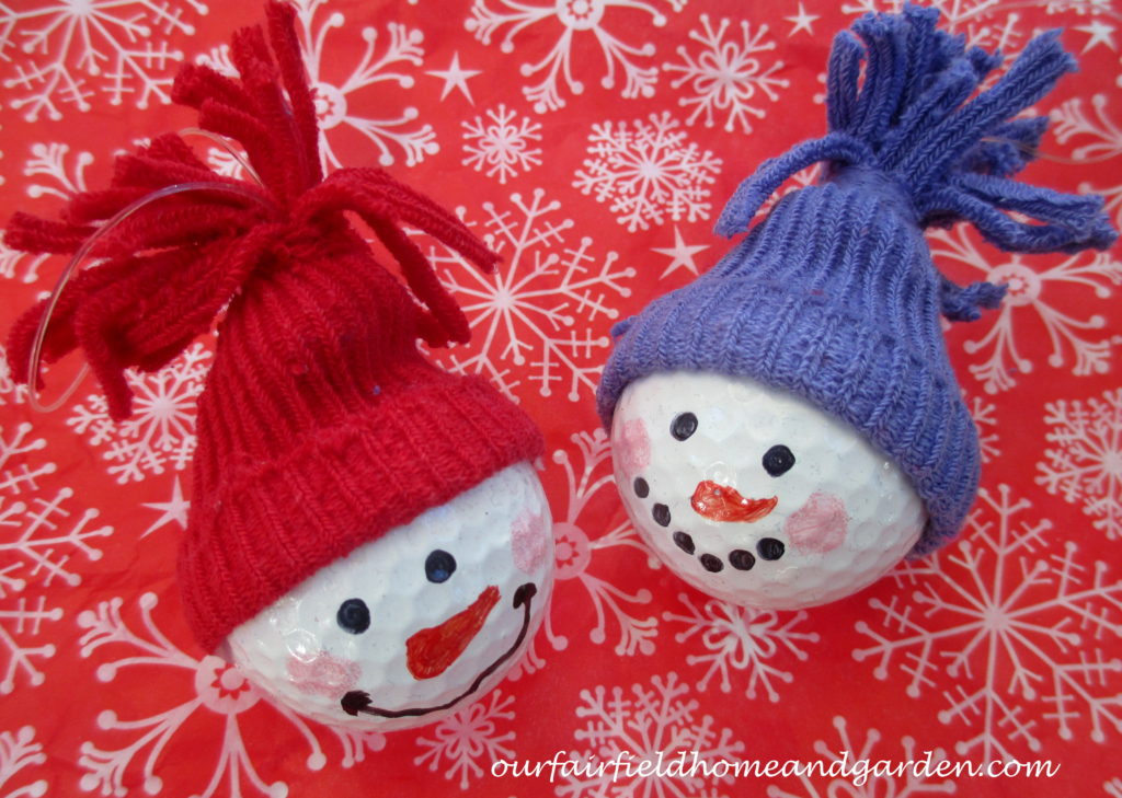 Snowman Ornaments ~ from golf balls! https://ourfairfieldhomeandgarden.com/snowman-ornaments-from-golfballs/
