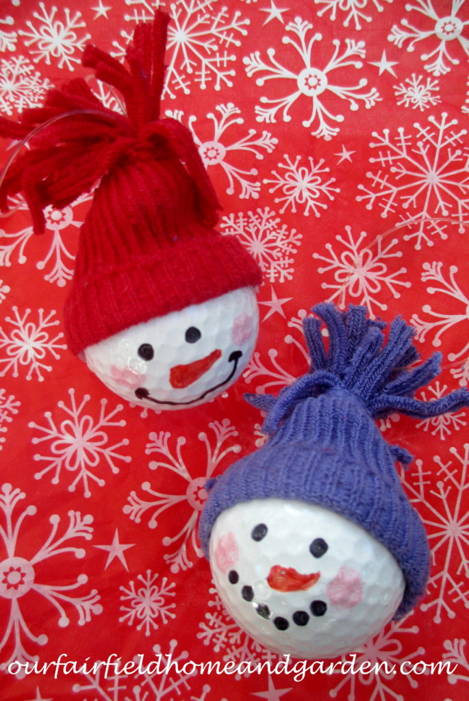 Snowman Ornaments ~ a quick and easy craft the whole family will enjoy! https://ourfairfieldhomeandgarden.com/snowman-ornaments-from-golfballs/