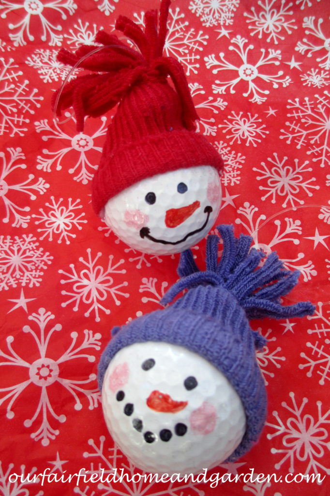 Snowman Ornaments ~ from golf balls! https://ourfairfieldhomeandgarden.com/snowman-ornaments-from-golfballs/