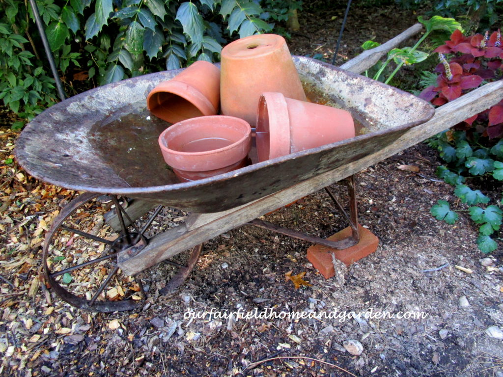 Wheelbarrow Water Feature https://ourfairfieldhomeandgarden.com/wheelbarrow-water-feature/