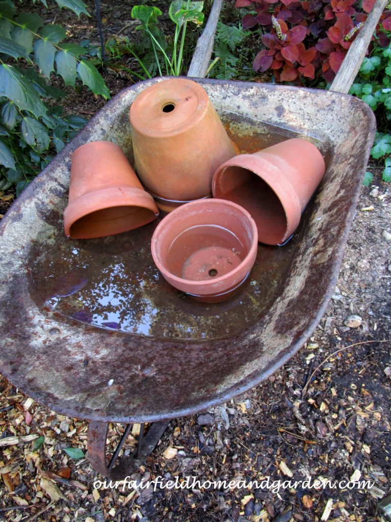 Wheelbarrow Water Feature https://ourfairfieldhomeandgarden.com/wheelbarrow-water-feature/