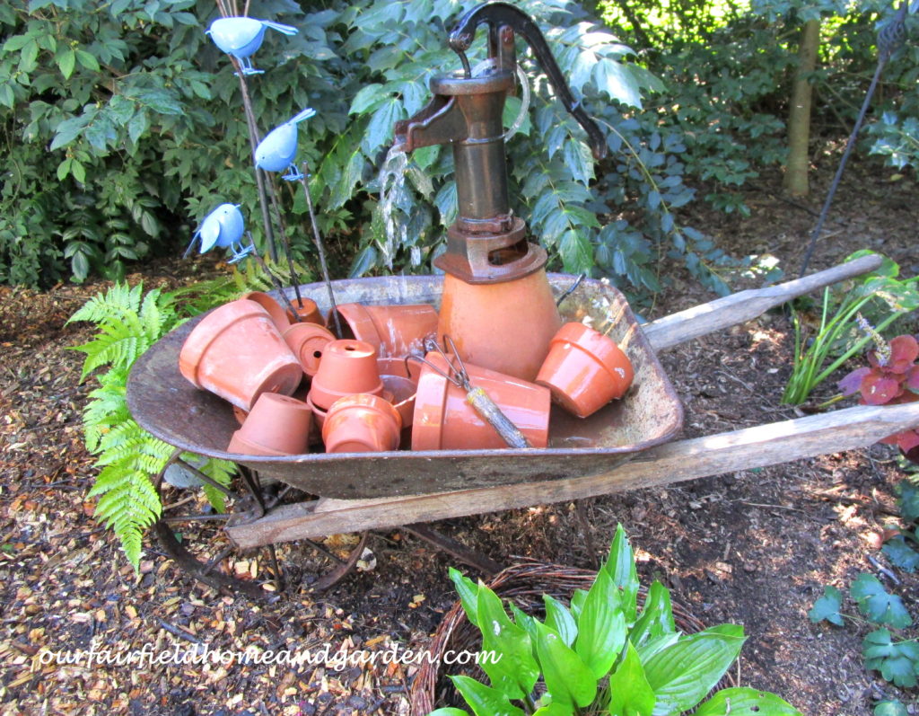 Wheelbarrow Water Feature https://ourfairfieldhomeandgarden.com/wheelbarrow-water-feature/