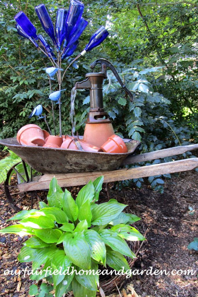 Wheelbarrow Water Feature https://ourfairfieldhomeandgarden.com/wheelbarrow-water-feature/
