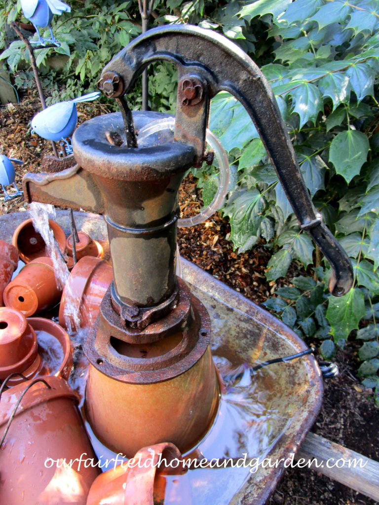 Wheelbarrow Water Feature https://ourfairfieldhomeandgarden.com/wheelbarrow-water-feature/