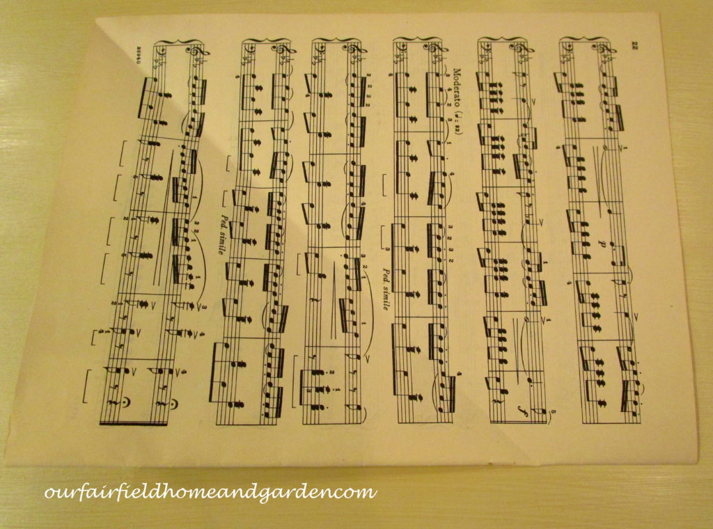 Music Sheet Christmas Tree https://ourfairfieldhomeandgarden.com/diy-make-music-sheet-christmas-trees/