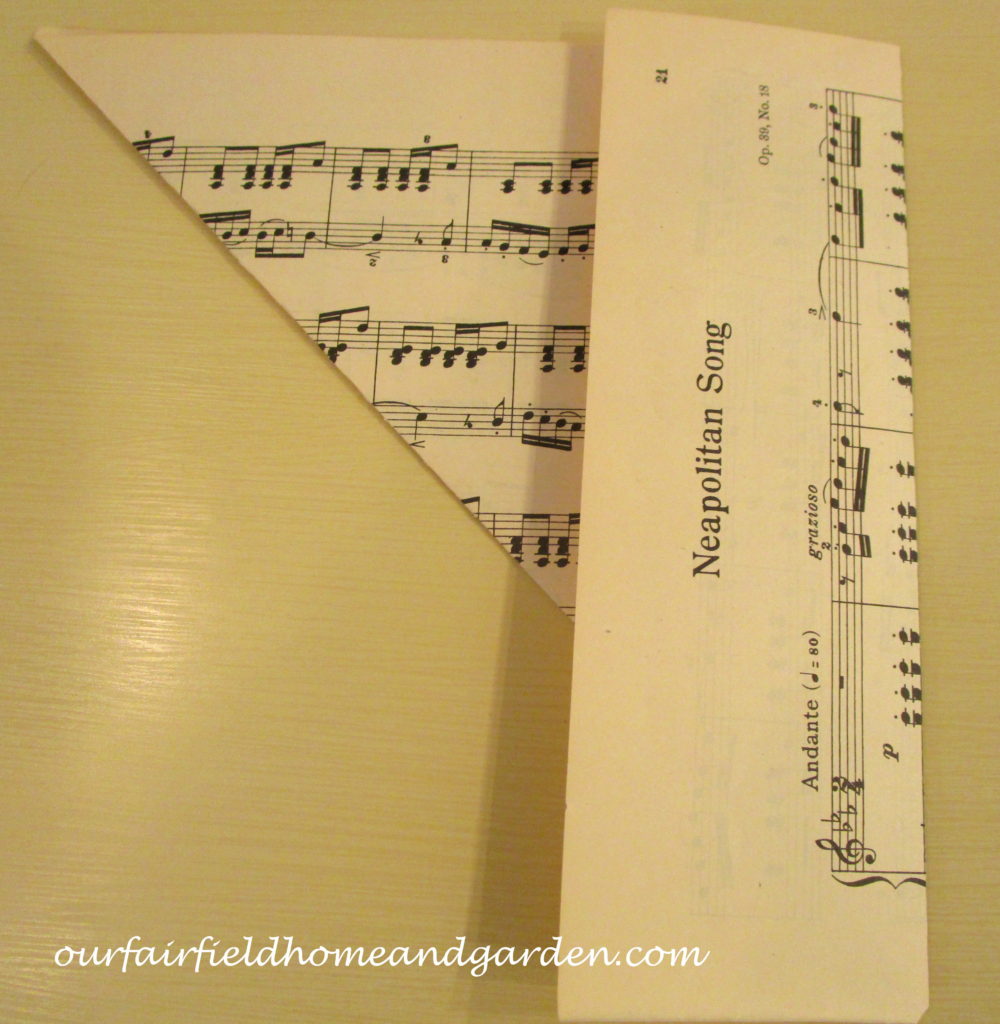 Music Sheet Christmas Tree https://ourfairfieldhomeandgarden.com/diy-make-music-sheet-christmas-trees/