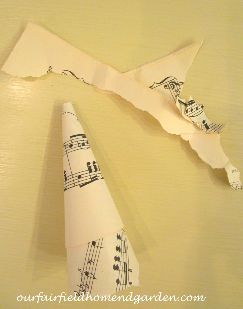 Music Sheet Christmas Tree https://ourfairfieldhomeandgarden.com/diy-make-music-sheet-christmas-trees/