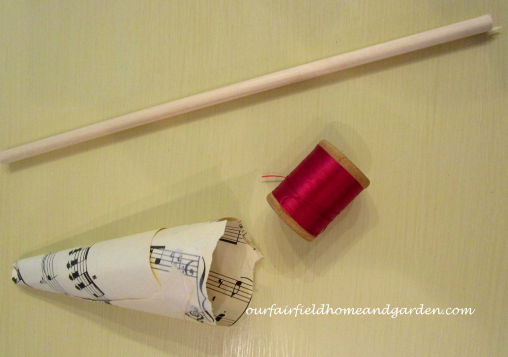 Music Sheet Christmas Tree https://ourfairfieldhomeandgarden.com/diy-make-music-sheet-christmas-trees/