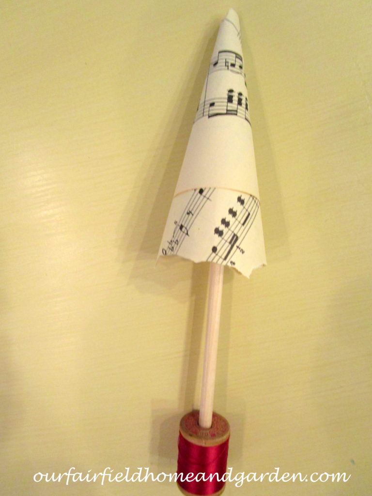 Music Sheet Christmas Tree https://ourfairfieldhomeandgarden.com/diy-make-music-sheet-christmas-trees/